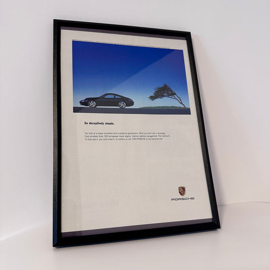 Porsche so deceptively simple framed ad