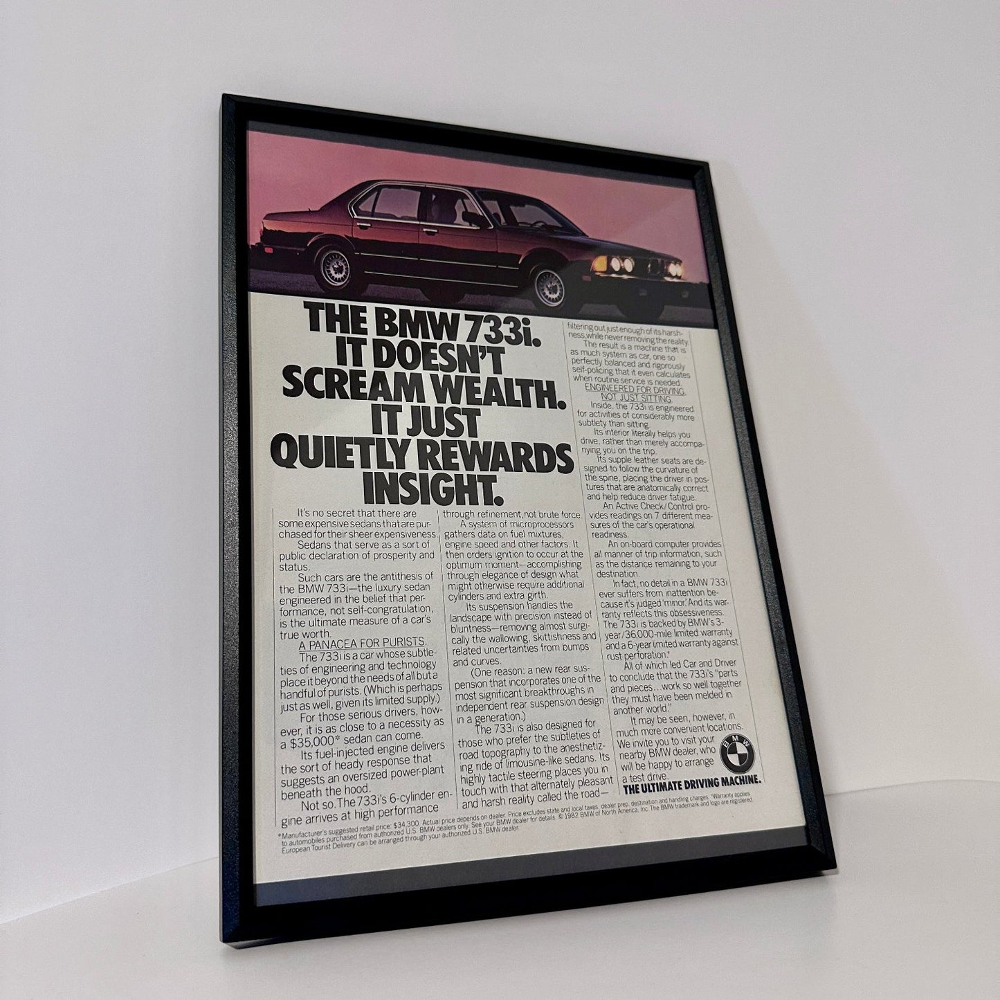 the Bmw 733i framed ad