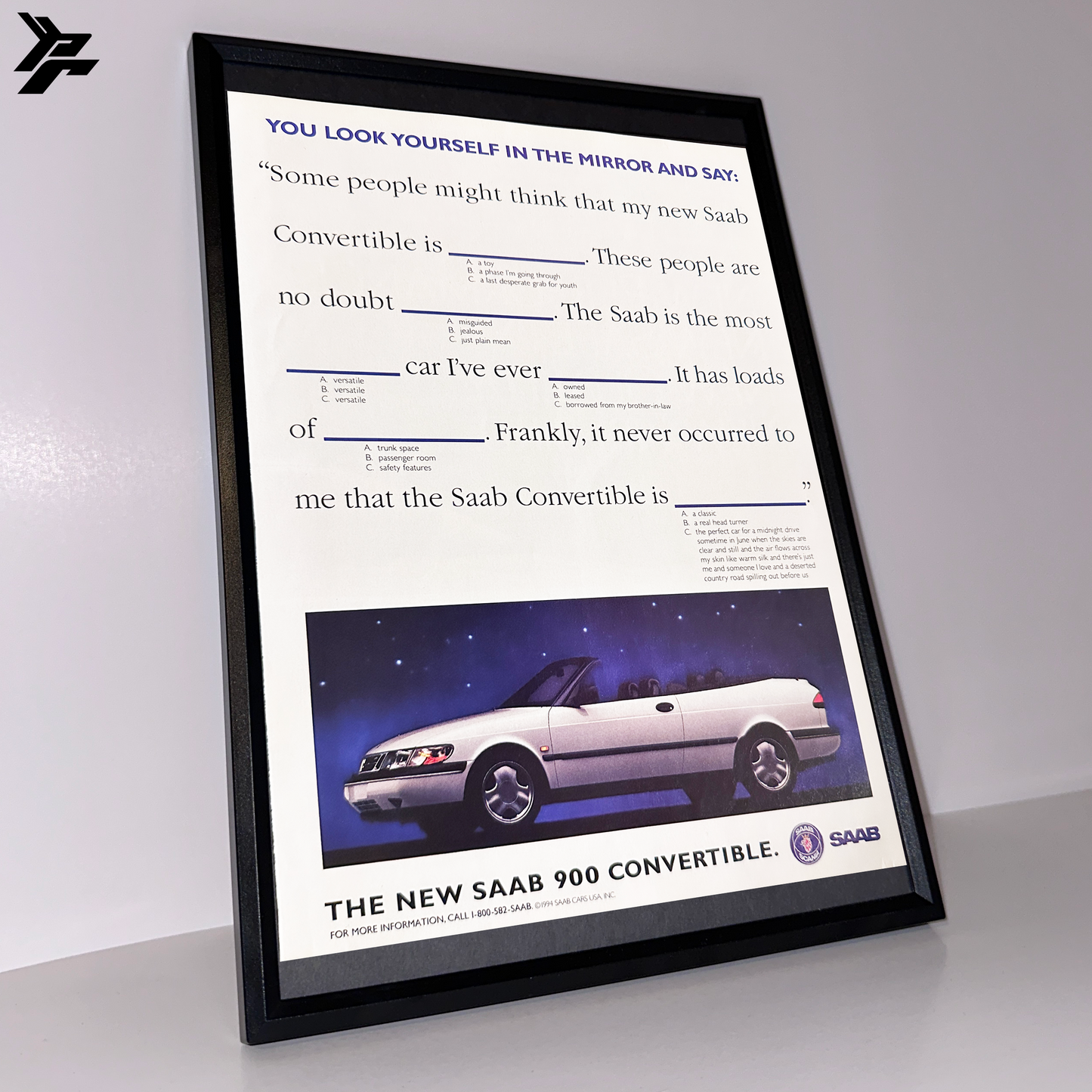 The new Saab 900 convertible framed ad